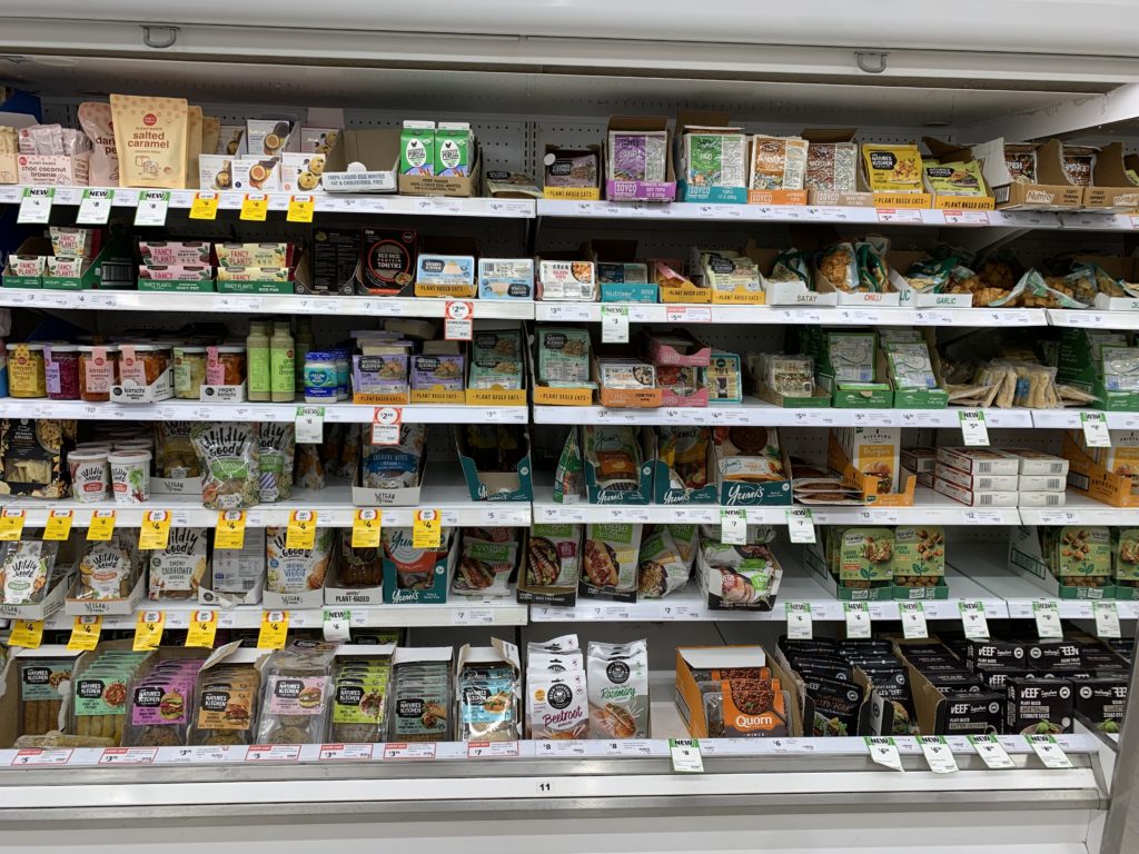 A huge display of plant-based foods in a supermarket